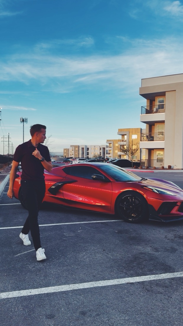 Torin with his 2022 Corvette C8 — the car the system bought